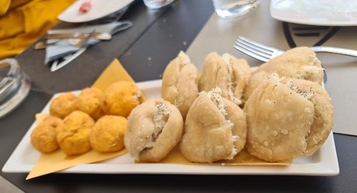Mangiando photo 5