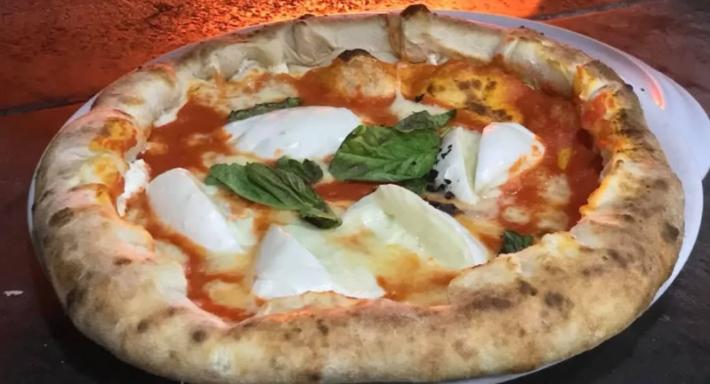 Pizzeria-Osteria E Io Pago photo 1